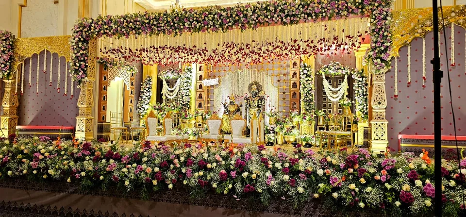 Blush pink grand stage with dense floral borders
