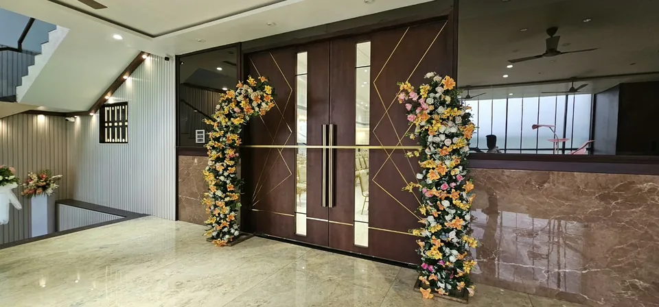 Home entrance styled with floral door frame for a housewarming